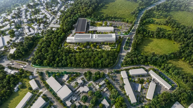 3D vizualizace výrobní haly z ptačí perspektivy s parkovištěm, zelenou střechou a parkovou úpravou 3D vizualizace výrobní haly z ptačí perspektivy s parkovištěm, zelenou střechou a parkovou úpravou